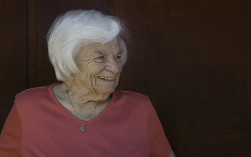 Dee Krieger smiling at 96.