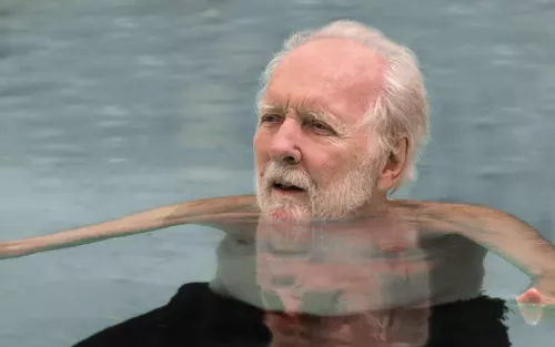 Harold Dull floats in the pool.
