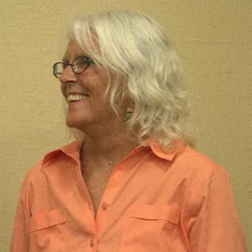 Profile view of Jan Schwartz, smiling.