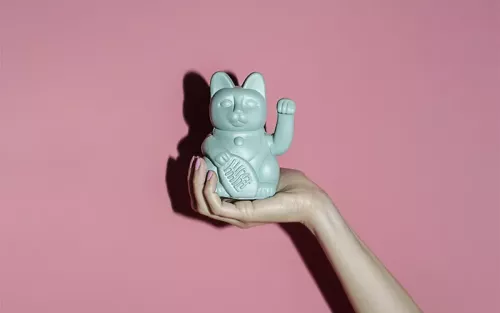 A maneki-neko, or good luck cat.