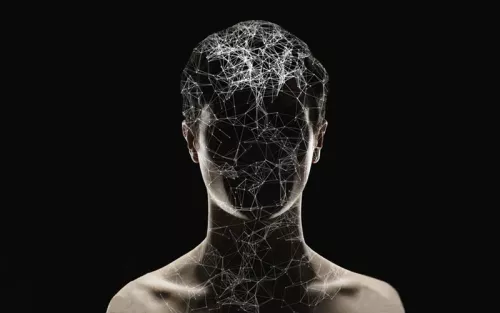A 3D connected web of lines and dots form an outline of a human shape.