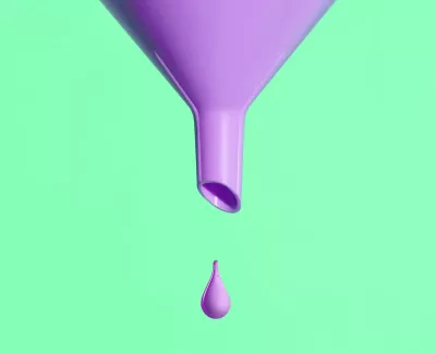 a neon purple funnel with a single drop of purple against a green background.