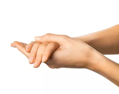 two hands clasped together.