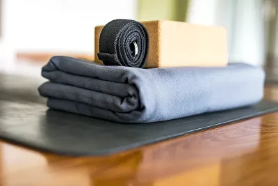 a yoga block, strap, and bolster are all great examples of supportive props.
