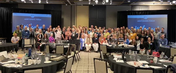 Attendees of the 2022 ABMP School Forum pose for a group picture.