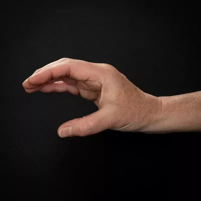 Demonstration of placing the thumb in a 