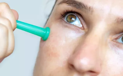 Close up of a woman's cheek with a small cupping too.