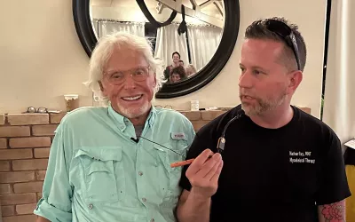 Erik Dalton, left, and Nate Fay, right, take a break during a recent MAT workshop. 