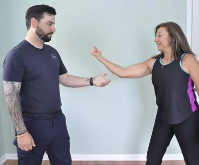 Author Teresa Matthews shows she has broken free of the client's hold.